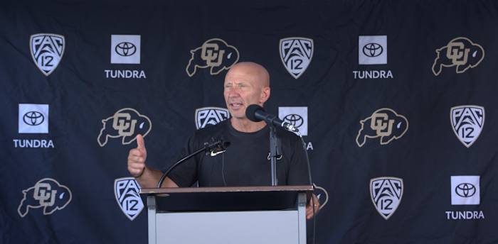 Charles Kelly speaks to media after practice on Aug 2.